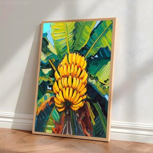 May include: A framed art print depicting a bunch of yellow bananas, set against a backdrop of lush green banana leaves. The artwork is presented in a natural wood frame, creating a striking contrast. The painting evokes a tropical theme.