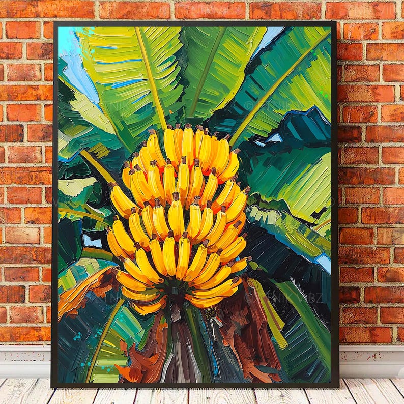May include: A colourful painting depicting a cluster of yellow bananas with large green leaves. The artwork is framed in black and set against a brick wall. The painting evokes a tropical theme, with the bananas as the focal point.