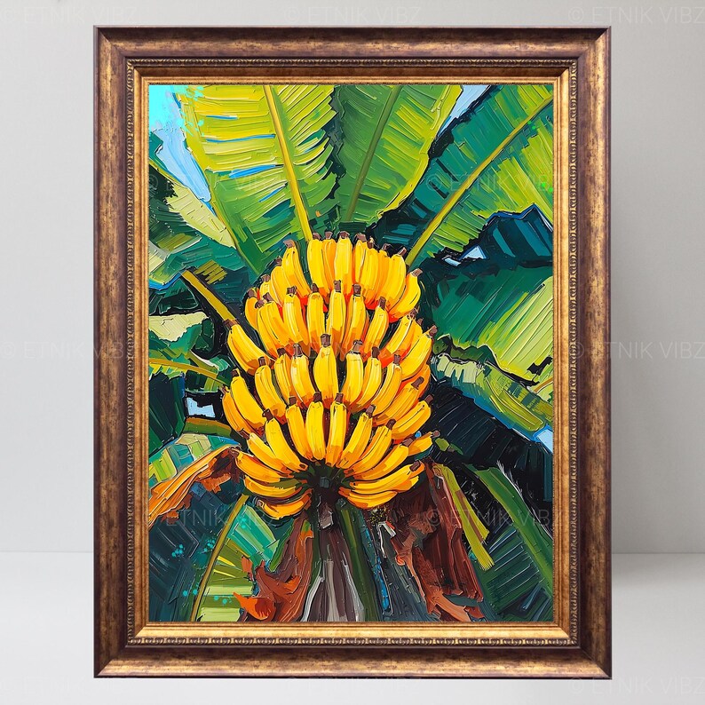 May include: A framed painting depicting a cluster of yellow bananas set against lush green banana leaves. The artwork is presented within a decorative, gold-coloured frame. The painting's vibrant colours and detailed brushstrokes create a tropical feel.