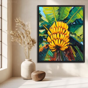 May include: A framed art print showing a painting of a bunch of ripe yellow bananas and green banana leaves. The artwork has a textured, impressionistic style, with a black frame. The painting is in a black frame.