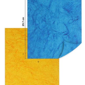 May include: Two sheets of textured paper, one blue and one yellow. The blue sheet is 21 cm wide and 29.7 cm tall. The yellow sheet is partially visible beneath the blue sheet. The paper has a crinkled, handmade appearance, suggesting a craft product.