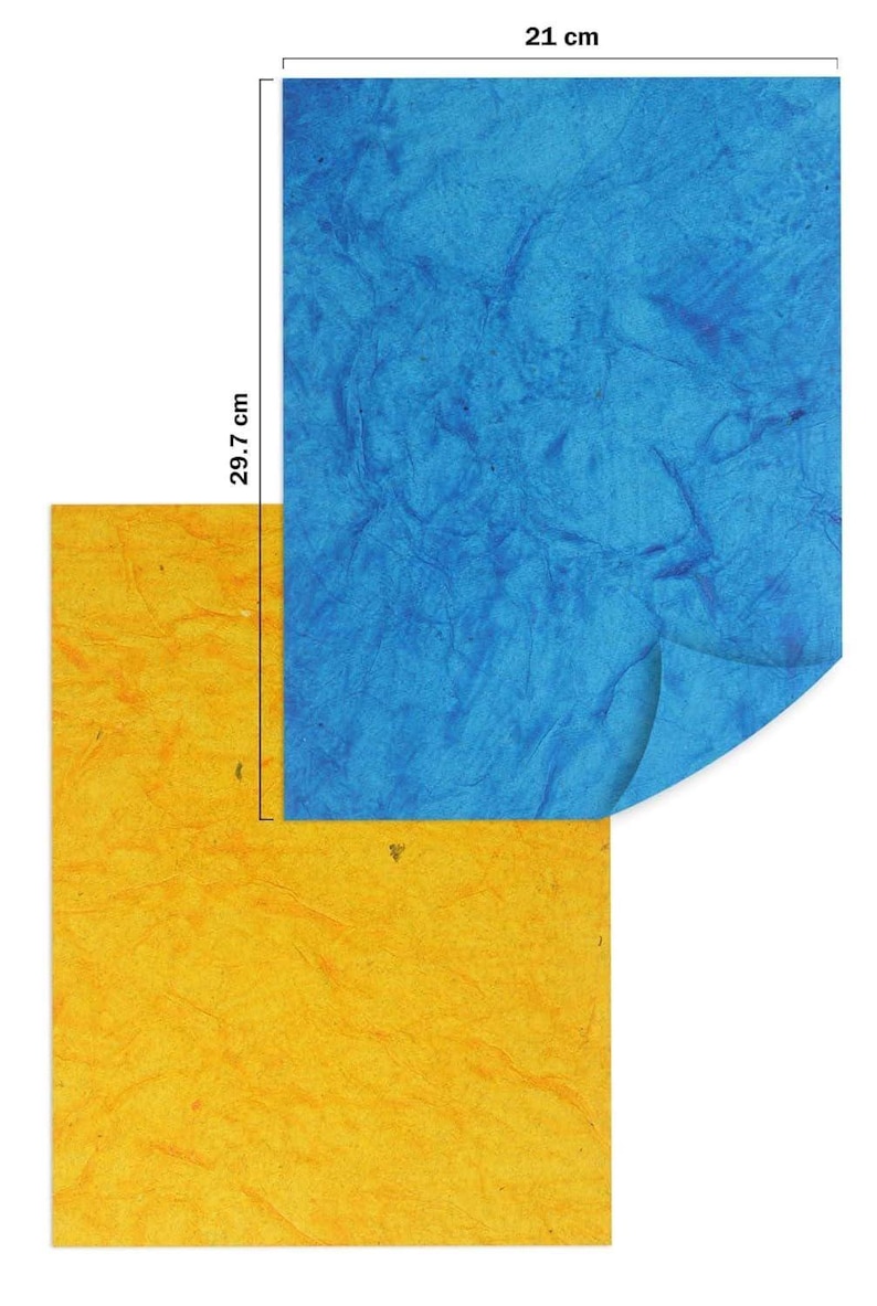 May include: Two sheets of textured paper, one blue and one yellow. The blue sheet is 21 cm wide and 29.7 cm tall. The yellow sheet is partially visible beneath the blue sheet. The paper has a crinkled, handmade appearance, suggesting a craft product.