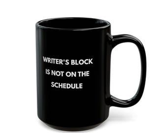 El bloqueo del escritor no está en la agenda. Taza negra.