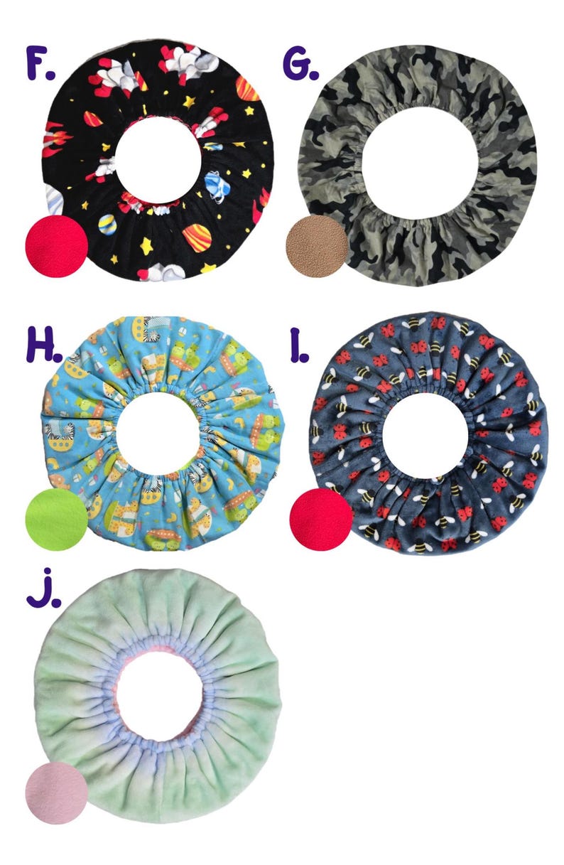 May include: Circular fabric covers in various patterns. Designs include a black space-themed print, camouflage, a blue pattern with cartoon characters, a navy pattern with bees, and a light green cover.