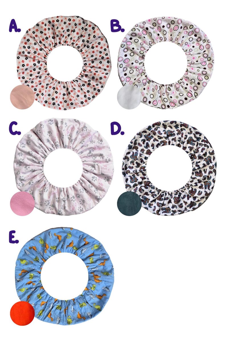 May include: Five fabric covers with a central hole, each with a unique pattern. Designs include small flowers, circles, paw prints, leopard print, and dinosaurs. Each cover has a coordinating colour swatch.