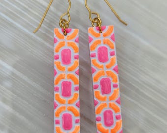 Bright neon pink and orange tile patterened polymer clay dangle earrings