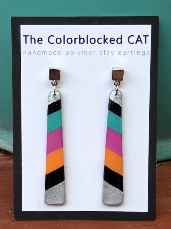 Slim striped SPURS inspired earrings: Teal, pink, orange and black slightly tapered polymer clay earrings