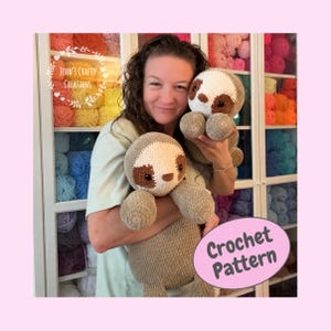 May include: Two plush sloth toys made of soft, light brown and cream-colored yarn with dark brown eye patches and black safety eyes. The toys feature a rounded head and limbs. A pink oval graphic in the corner displays the text Crochet Pattern.