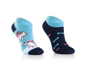 May include: Two pairs of ankle socks with a blue and white color scheme. One pair features a cartoon dog design, while the other pair has a pattern of pink hearts and blue bones.
