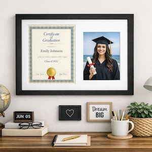 May include: A black framed graduation certificate and photograph. The certificate states "Certificate of Graduation" and includes the name "Emily Johnson" and "Class of 2022." The photo shows a graduate in a cap and gown holding a diploma.