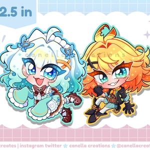 May include: Two cartoon stickers, each 6.35 cm tall, featuring anime-style characters. One has blue hair and a teal outfit, the other has orange hair and a black and blue outfit. The stickers have large eyes and are smiling. The background is a pastel color.