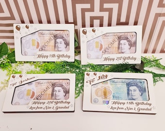 May include: Four wooden frames with a slot for a banknote. Each frame has a personalized message, including "Happy 18th Birthday" and "Happy 21st Birthday".