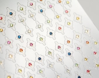 Pegatinas para uñas con estrellas de colores y diamantes de imitación en lámina dorada