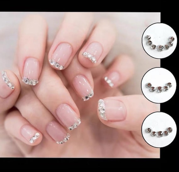 Rhinestone nail art design  Diamond nail art, Stone nail art, Gem nail  designs