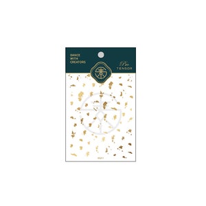 May include: A white sticker sheet with gold flecks and a white circle with a gold design in the center. The text "Pro Tensor" is printed in gold on a dark green background. The text "Dance with Creators" is printed in black on a white background.