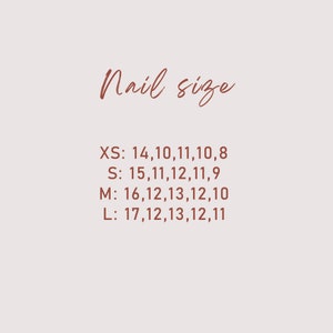 May include: A light pink informational chart titled Nail size in dark brown text. It lists four size categories: XS, S, M, and L, each followed by a sequence of five numerical values representing measurements in millimeters for nail sizing.