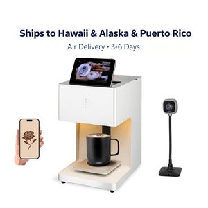 May include: A white coffee printer machine with a top-mounted tablet screen, a black mug placed on the base, and a separate black webcam on a flexible stand. A smartphone screen displays a rose graphic, matching the design on the coffee foam.