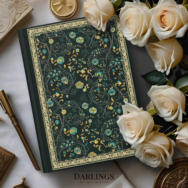 May include: A dark green journal with a floral pattern in teal and gold. The journal has a gold border and the words "DARLINGS OF ART DESIGNS" at the bottom. White roses and a gold pen are also in the image.