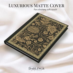 May include: A black notebook with a gold floral design and a matte cover. The cover reads "LUXURIOUS MATTE COVER" and "For a buttery soft touch".