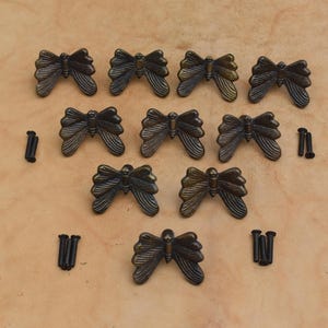 Pomelli vintage in ghisa a forma di farfalla, dipinti in oro, per cassetti e armadi, 10 pezzi