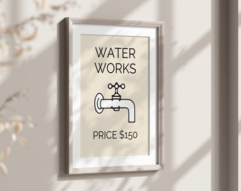 May include: Framed art print featuring the words "WATER WORKS" above a black and white faucet illustration. The text "PRICE $150" is below the faucet illustration. The print has a light beige background.