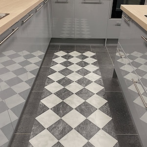 kitchen floor mat in black and white diamond check design