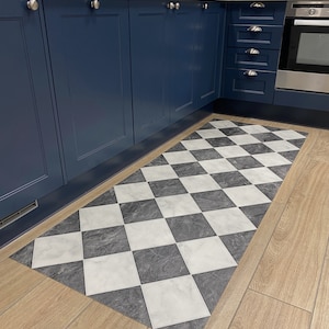 marble checkerboard runner rug in blue kitchen