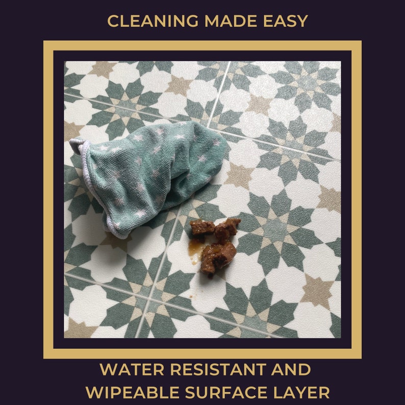 May include: A close-up of a green and white patterned floor tile with a brown stain and a green cloth on the floor. The text "CLEANING MADE EASY" is at the top of the image and the text "WATER RESISTANT AND WIPEABLE SURFACE LAYER" is at the bottom of the image.