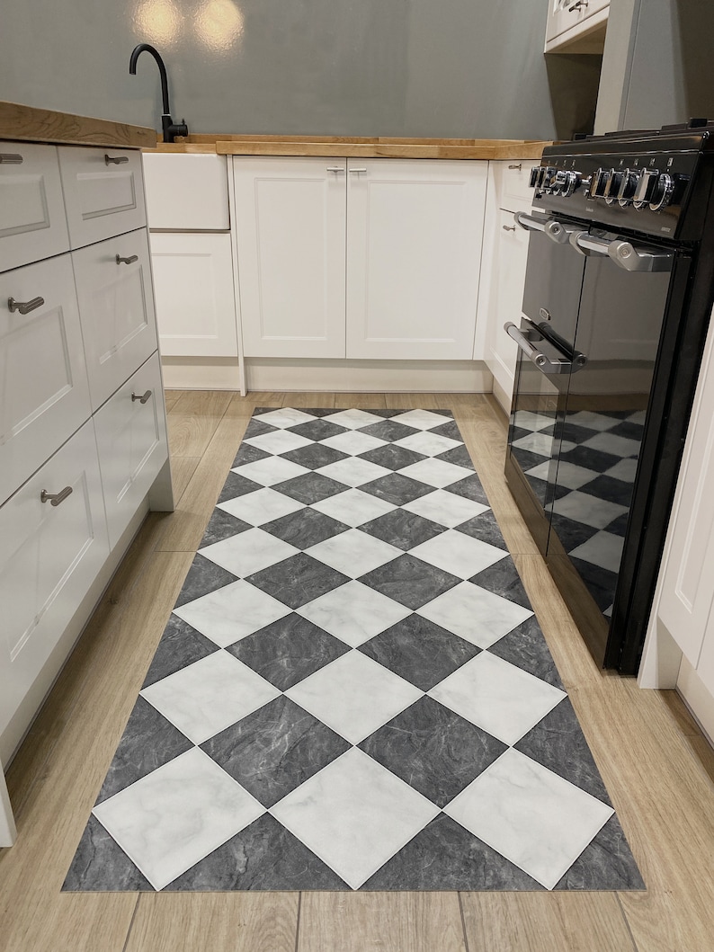 large kitchen with checkerboard pattern runner galley rug