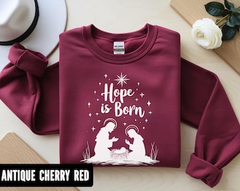 Hope is Born Crewneck Sweatshirt | Unisex Holiday Sweatshirt | Christmas Gift, Cozy Sweatshirt, Family Celebration Outfit, Religious Hoodie