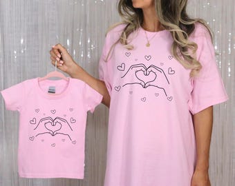 Valentine Heart Hands T-Shirt, Music Lover Gift Tee, Hand Heart Graphic Tee, Cute Heart Gesture Shirt, Fan Gift, Matching Heart Design