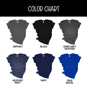 May include: Color chart showing ten different t-shirt colors: Asphalt, Black, Dark Grey Heather, Heather Navy, Navy, True Royal, White, Light Pink, Light Blue, and Yellow.