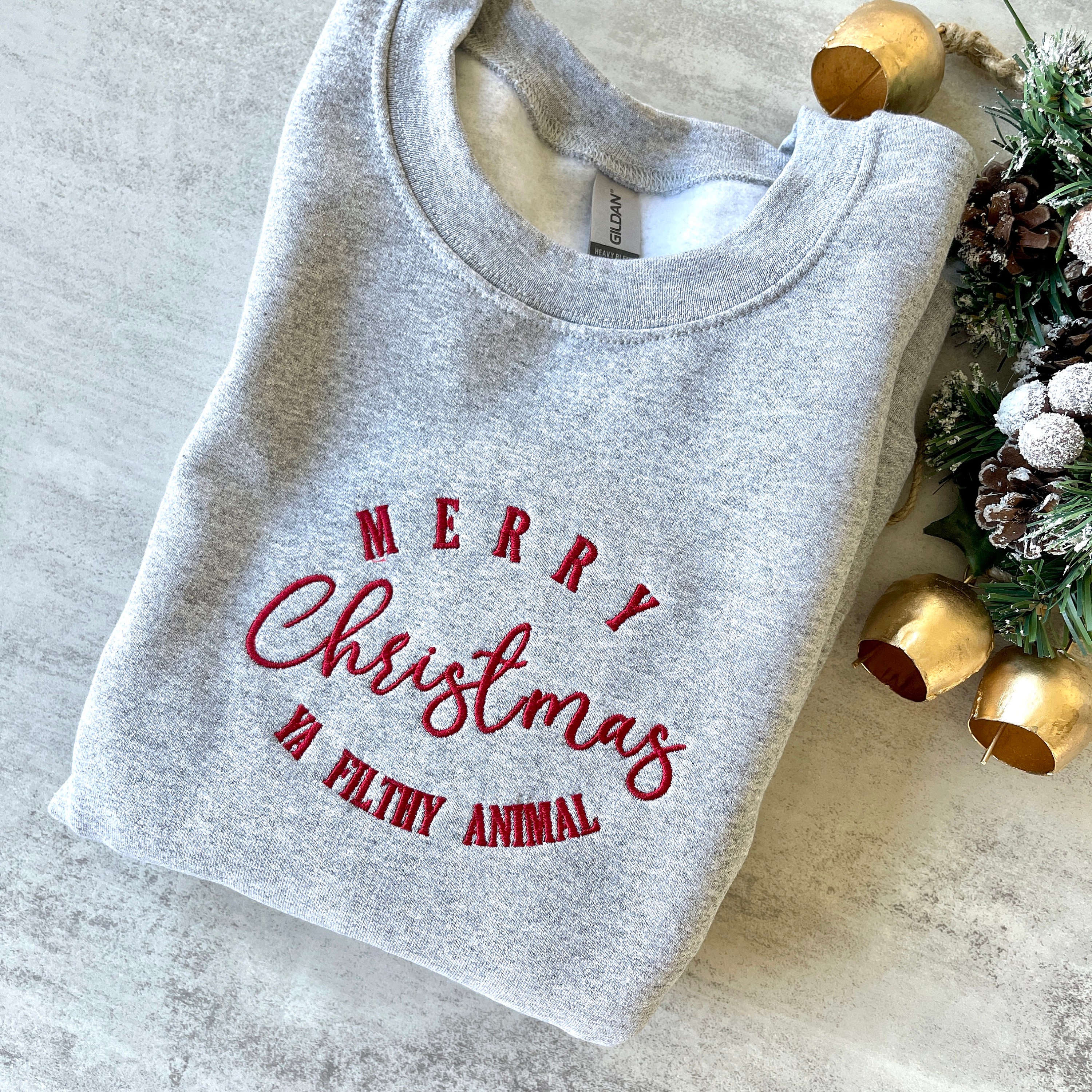 Merry Christmas Filthy Animal Unisex Tee (Tan) Merry Christmas Filthy Animal Unisex Tee (Tan)