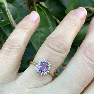 Vintage 9ct gold amethyst and diamond halo cluster ring, UK size M