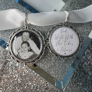 May include: Two silver charm pendants with white ribbon. One pendant features a photo of a father and daughter. The other pendant has the text "Dad Walk With Me Today & Always" with a small heart.