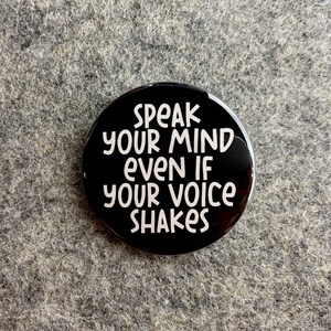 May include: Black button with white text that reads "Speak your mind even if your voice shakes."