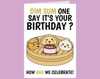 May include: A white greeting card featuring a bamboo steamer basket containing three cartoon dim sum characters and a small birthday cake with lit candles. The text reads: DIM SUM ONE SAY IT'S YOUR BIRTHDAY? HOW BAO WE CELEBRATE!