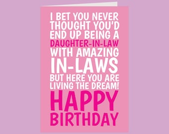May include: A rectangular greeting card with a pink background and white and dark pink text that reads: I BET YOU NEVER THOUGHT YOU'D END UP BEING A DAUGHTER-IN-LAW WITH AMAZING IN-LAWS BUT HERE YOU ARE LIVING THE DREAM! HAPPY BIRTHDAY.