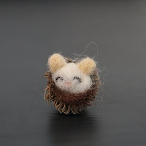 Tiny Felted Mouse nesting in acorn cap