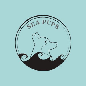 May include: Black and white illustration of a dog's head with waves behind it, inside a circle with the text "SEA PUPS" in grey.