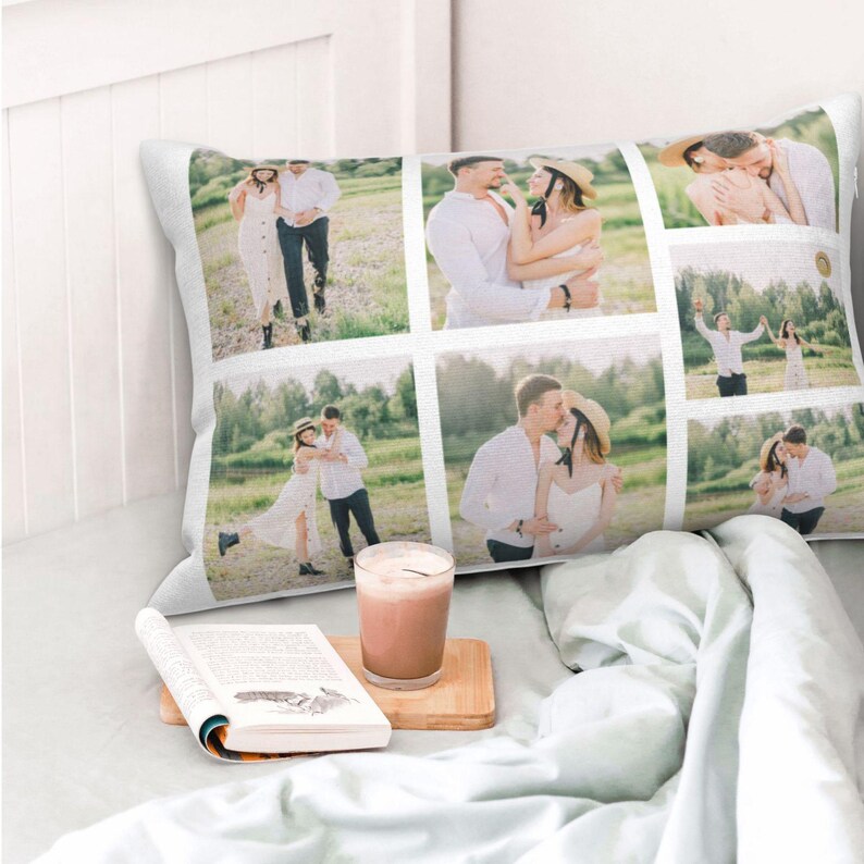May include: A white pillow featuring a collage of six photographs of a couple in a field. The images depict the couple smiling, laughing, and embracing. The pillow is an excellent way to add a personal touch to your home decor.