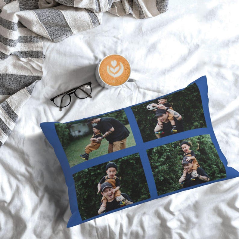 May include: A blue pillow featuring four photographs of a father and son. The images depict the father and son enjoying time together in a park setting. This pillow is a lovely way to add a personal touch to your home decor.