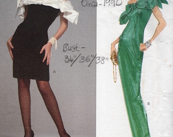 May include: Vogue Patterns 2588 sewing pattern for a dress with a bust measurement of 34, 36, or 38 inches. The pattern is from circa 1990 and designed by Victor Costa. The pattern shows two versions of the dress, one in black and one in green.