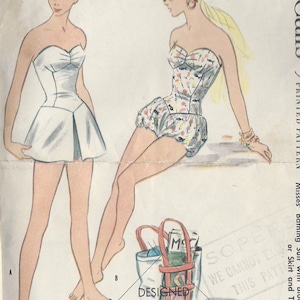 May include: Vintage 1955 sewing pattern for a swimsuit with a skirt and bloomers. The pattern is printed on white paper with a black and white illustration of two women wearing the swimsuit. The pattern is labeled "R890" and "1955".