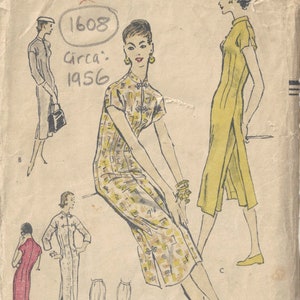 May include: A vintage Vogue sewing pattern from 1956, featuring a dress with a mandarin collar and a long, flowing skirt. The pattern number is 8805 and the size is 36 bust, 39 hip.