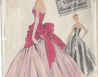 May include: A vintage Vogue sewing pattern for a formal gown. The pattern is for size 10 and features a pink gown with a large red bow at the back. The pattern is labeled "Vogue Special Design".