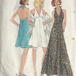 May include: Vintage sewing pattern showing three halter dresses. One is a blue polka dot mini dress, another is a white mini dress, and the third is a long black floral print dress. The pattern includes sizes 8, 10, 12, 14, and 16.