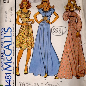 May include: Vintage McCall's sewing pattern 4481 for Misses' dresses. The pattern features three dress designs, including a floral print and a solid blue gown. Bust size is 34 inches (87 cm). Circa 1975.