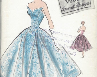 May include: Vintage Vogue sewing pattern featuring a blue and white floral print dress with a full skirt. The illustration shows a woman in the dress, with a smaller illustration of a pink dress. The Vogue logo and "Special Design" are visible.