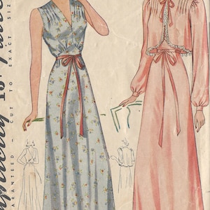 May include: Vintage sewing pattern for a long, sleeveless dress with a floral print and a matching sash. The pattern is for a size 40 bust and 43 hip. The pattern is from 1949.
